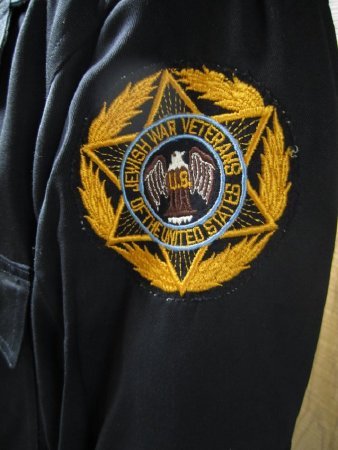 Patch on left sleeve of jacket