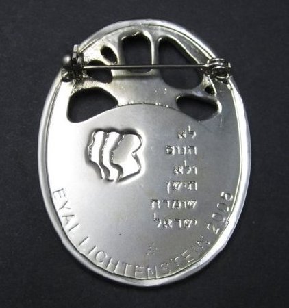 Silver pin, back view